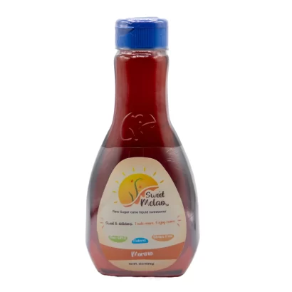 A transparent bottle of sweet melody ketchup with a blue cap, labeled "new natural sweetener cane sweetened ketchup - sweet & delicious, made with care, enjoy more!" against a white background